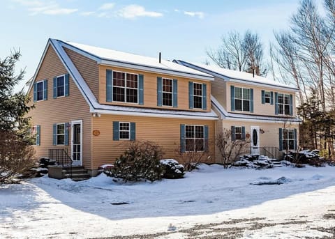 Driveway view of homes.