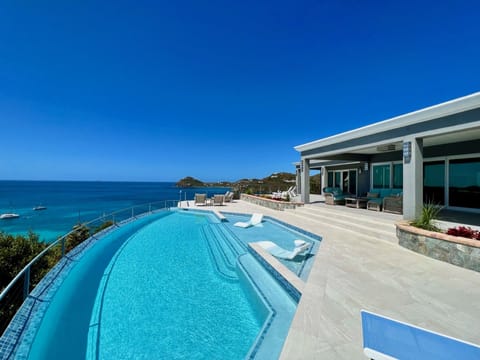 Large pool deck with expansive views