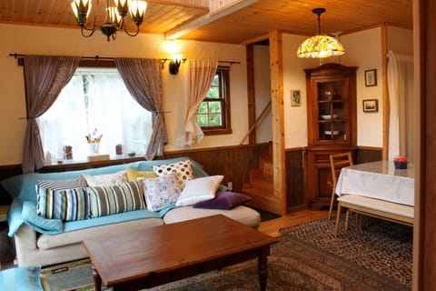 Living room/Large couch where you can enjoy a wide conversation.