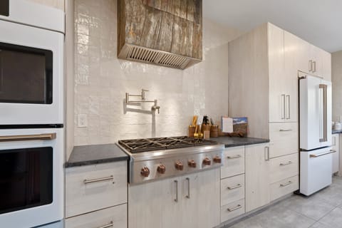 Kitchen with high end appliances and pot filler