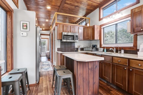 Full kitchen with bar seating