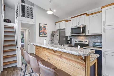 Full kitchen with bar seating