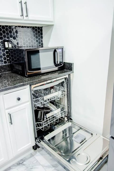 Fully equipped kitchen with modern appliances and all the essentials for cooking.