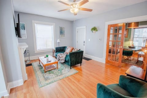 Bright and airy living room designed for relaxation and group gatherings.