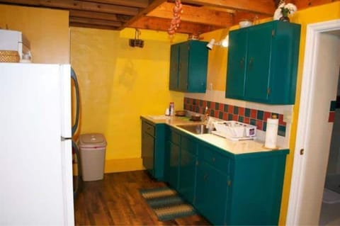 The kitchen is well stocked.  There’s a microwave above the stove also. 