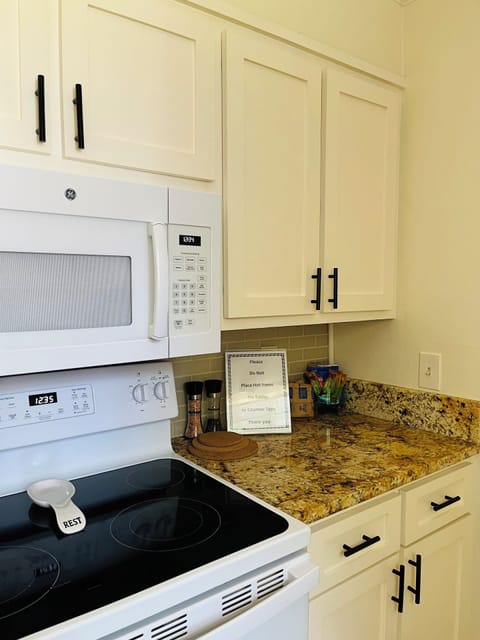 Galley-style kitchen with ample counter space for meal (or snack) prep