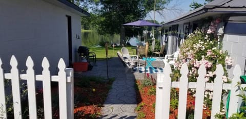 A welcoming walkway and patio greets you upon arrival.