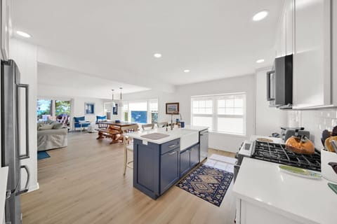Another view of the gorgeous fully stocked kitchen