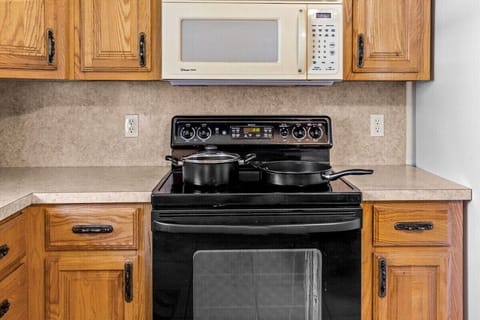 Stove, oven and microwave available as well as pots and pans.