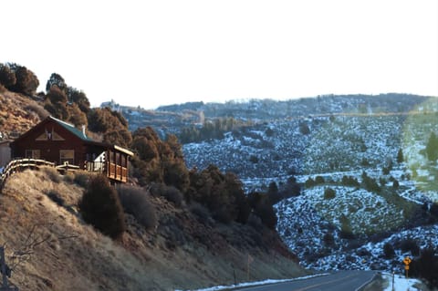 The cabin sits above CR 8.