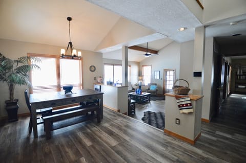 Large Dining table overlooks living area