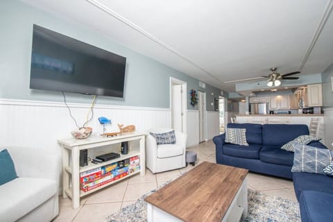 Inviting living space w/ comfy seating & TV, great for movie nights or laid-back evenings.