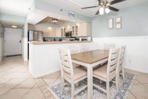 Open dining area w/ white finishes that flows easily into the kitchen for shared meals & conversation.