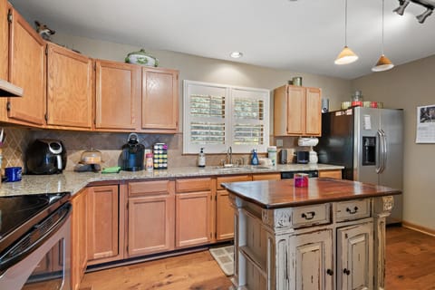 Kitchen with Ample Cabinet Space and an Island for Extra Prep Space