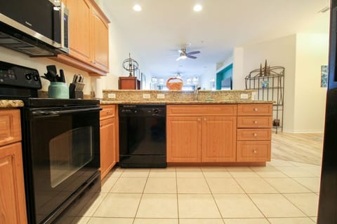 kitchen fully equipped with dishwasher/stove/microwave/full size refrigerator