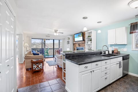 Entry opens into the kitchen and living areas