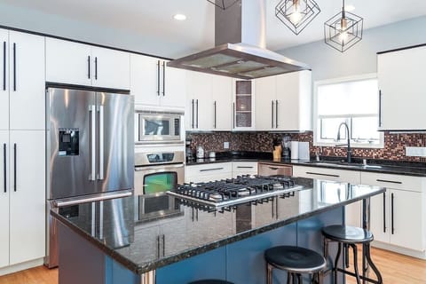 Unit 1 - Living Room / Dining Room / Kitchen Combo (kitchen is fully stocked with 3 counter height stools at island)