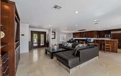 Cozy coach , big brand new tv. Watch sports ,movies or play family games 