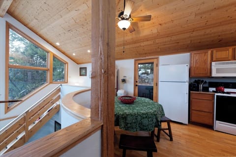 Kitchen and Dining - Overlook into the Main Living Space (2 Bedroom Cabin)