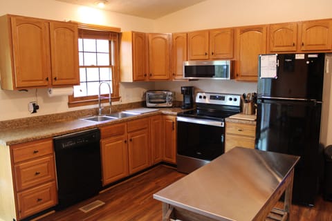 Kitchen w/ Dishwasher, toaster oven, coffee maker