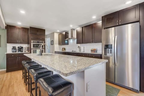 The kitchen that has everything that you need, wonderfully setup for gathering with your loved ones even when cooking!