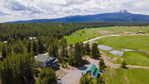 "The Bear Den Bundle" is a beautiful and idyllic location that transforms into a Winter Wonderland when the snow falls. With miles and miles of snowmobile trails just steps away, it's the perfect place for those seeking winter adventure.