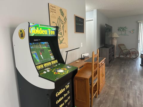 Enjoy the Golden Tee Arcade Game Cabinet