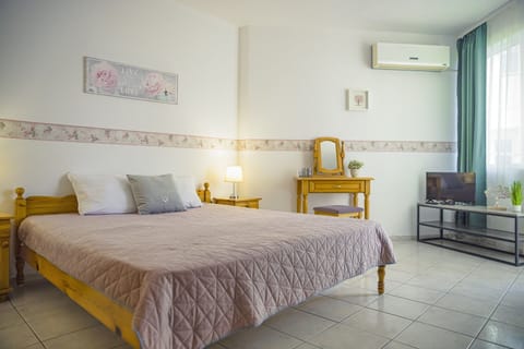 double bed,TV, cosmetic table,air-conditioning