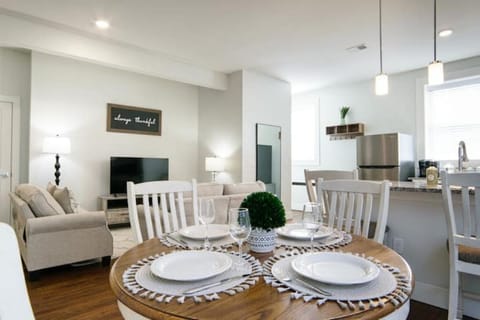 Wonderful open concept apartment. Kitchen, dining, and living area.