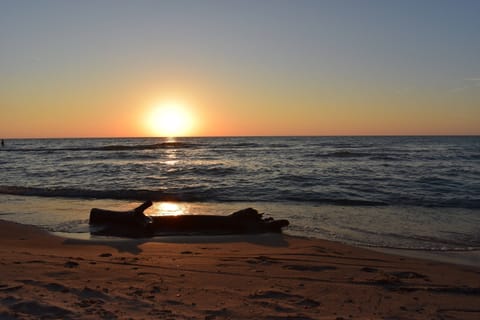 Private Sandy Beach, with gorgeous sunsets, minutes from the condo!