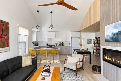 Open-Concept Living – Bright, airy space with designer furniture, curated artwork, and plenty of natural light.