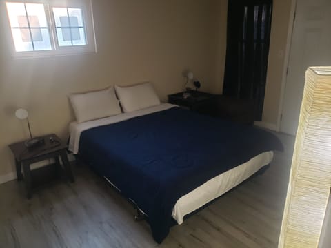 1st bedroom. With TV and attached bathroom. 