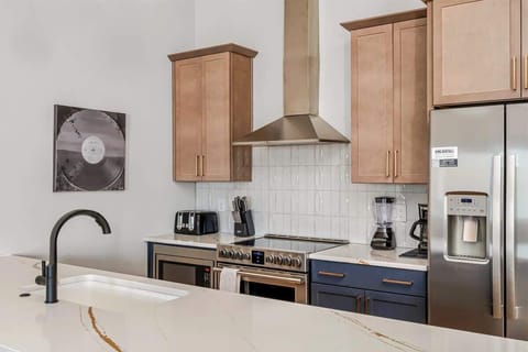 Enjoy cooking or casual dining at the spacious kitchen island.