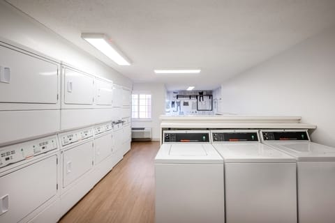 Refresh your wardrobe easily with roomy, bright laundry facilities.