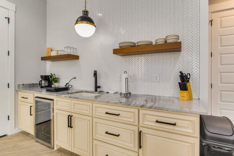 The kitchenette offers a mini fridge, hot stove, and coffee maker.