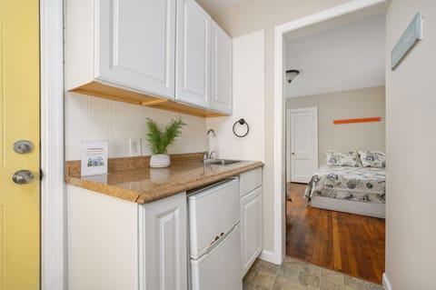 The wet bar and mini fridge just off the Primary Bedroom for ultimate convenience