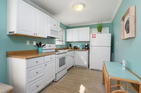 The Well-Stocked kitchen with full size appliances offers all of the comforts of home