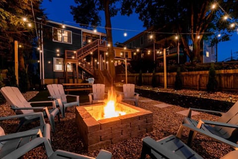 Sit fireside in our private backyard retreat.