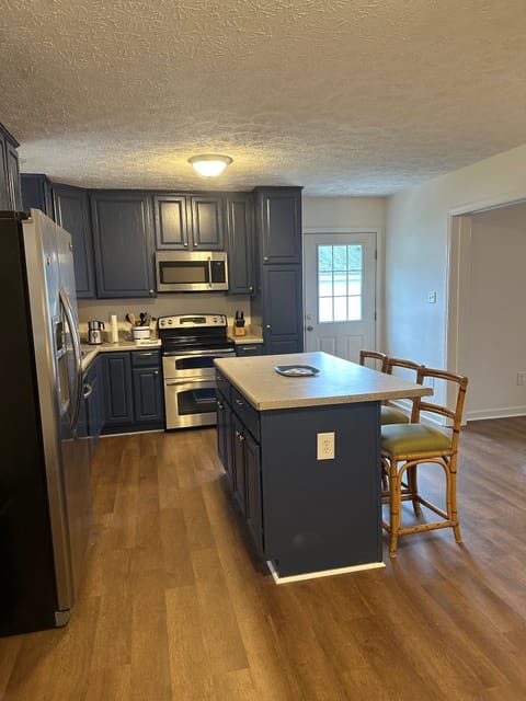 Spacious kitchen stocked with everything you need.