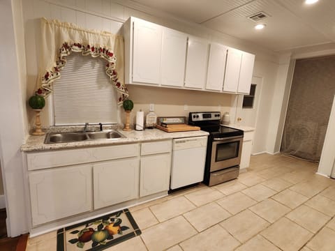 Kitchen with view of laundry area