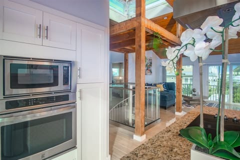 Stainless steel appliances in the kitchen.