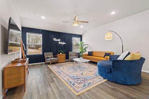 Open concept living room with cozy accommodations! 