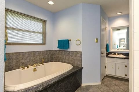 Ensuite includes separate vanities and two generous walk-in closets