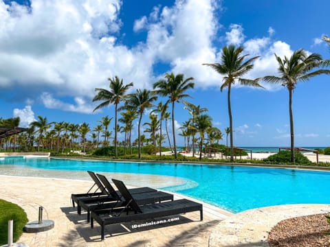 Swimming pool of your residential  overlooking a private beach