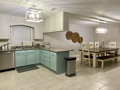 Fully stocked kitchen and dining area.