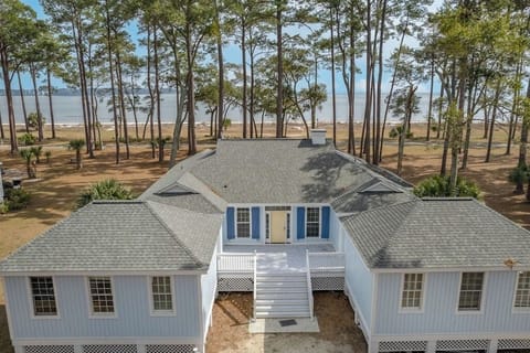 Beach Front! Beautiful view looking out to the south end of Hilton Head and Atlantic Ocean. Two king bedrooms in the front of the property. 