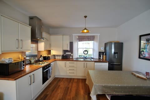 The ground floor dining kitchen is fully-equipped