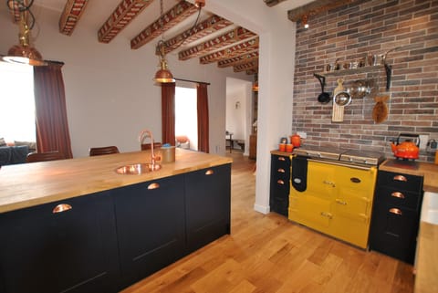 The feature Aga is the focal point of the kitchen