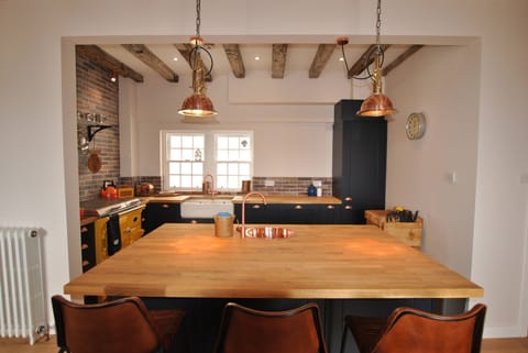 The well equipped kitchen has plenty space to cook together