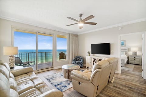 Relax in this modern living room with ocean views and direct balcony access.